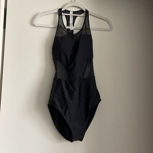 Lululemon black one-piece; never been worn; size 8